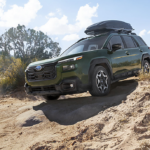 A new Subaru vehicle driving on rough terrain
